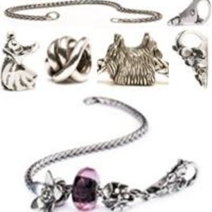 Alles saam sal dit soorgelyk soos hierbo lyk, die ketting met slotjies en die ornamentjies.